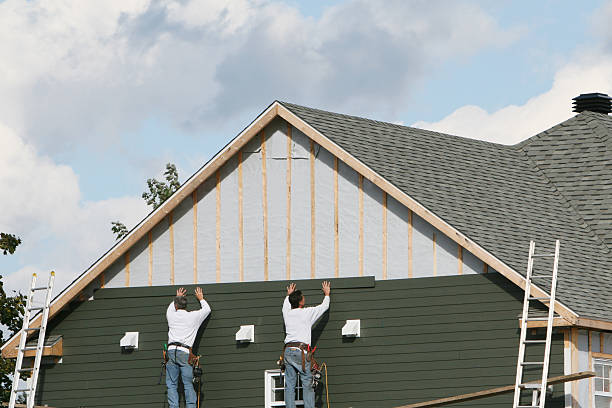 Professional Storm Damage Siding Repair technician working in Westville, NJ